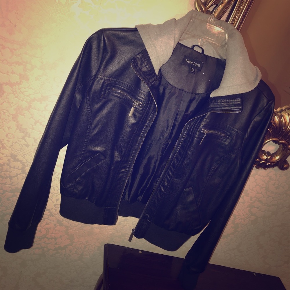 Leather jacket with a grey hoodie